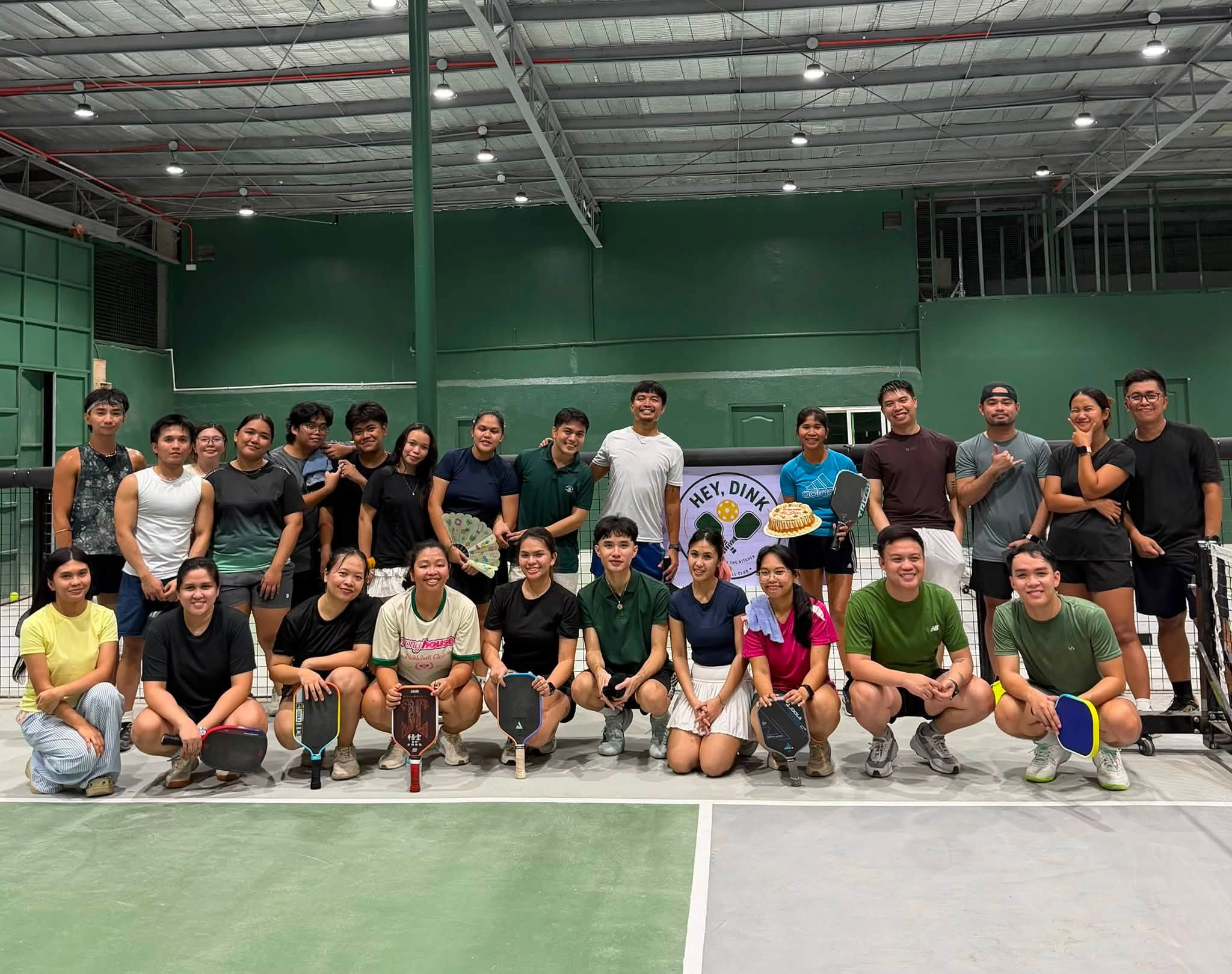 The Hoops & Racket community posing after a game
